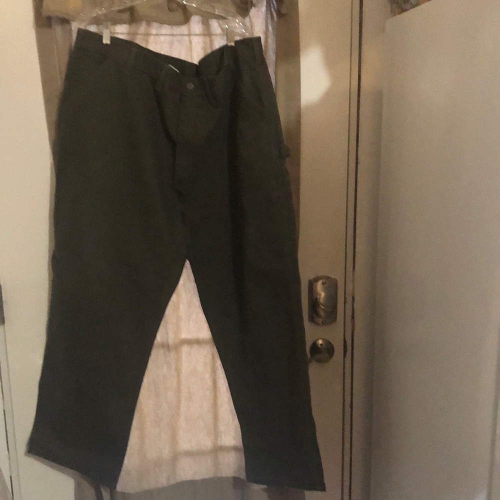 Worn once  olive green Carhartt work duck jeans 46w30L